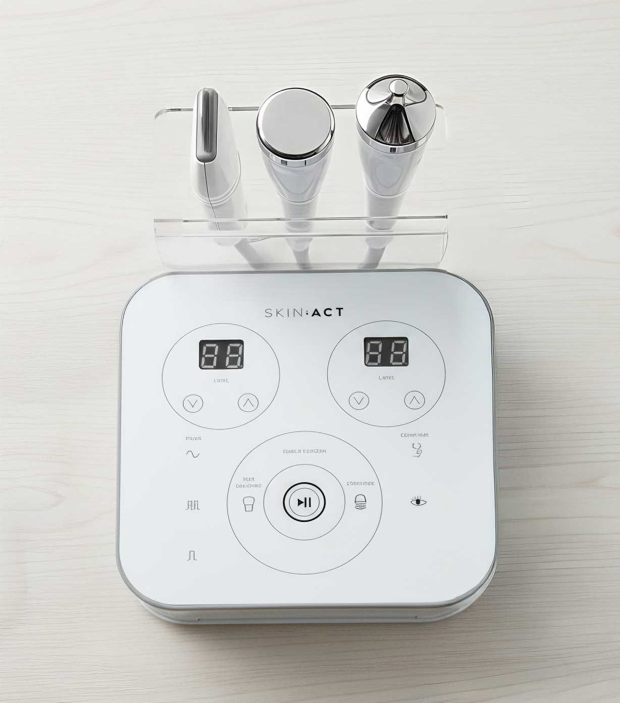 White Skinact 2-in-1 Ultrasonic Skin Scrubber with electronic device with digital display and control buttons, branded 'SKINACT', on a light wooden surface.