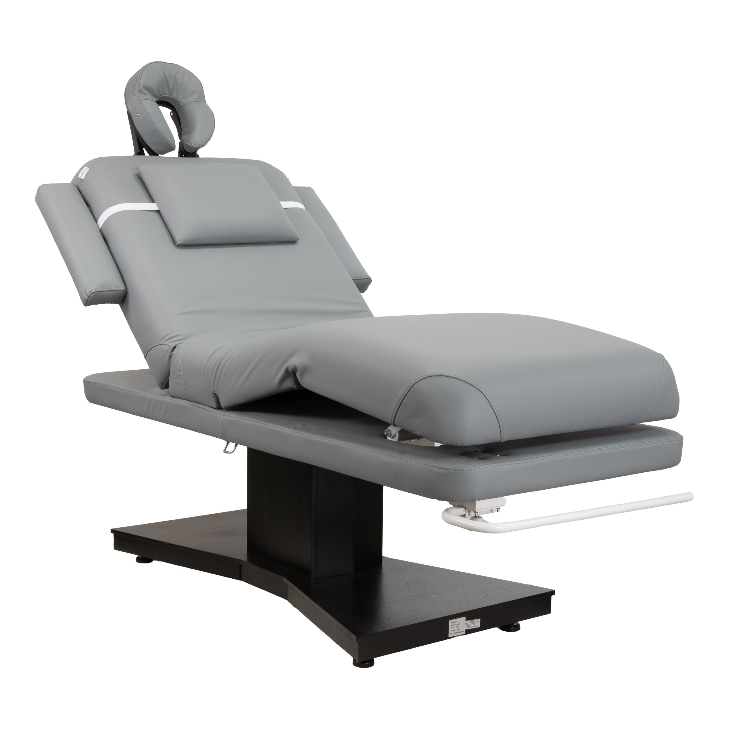 Gray massage table with adjustable headrest on a white background