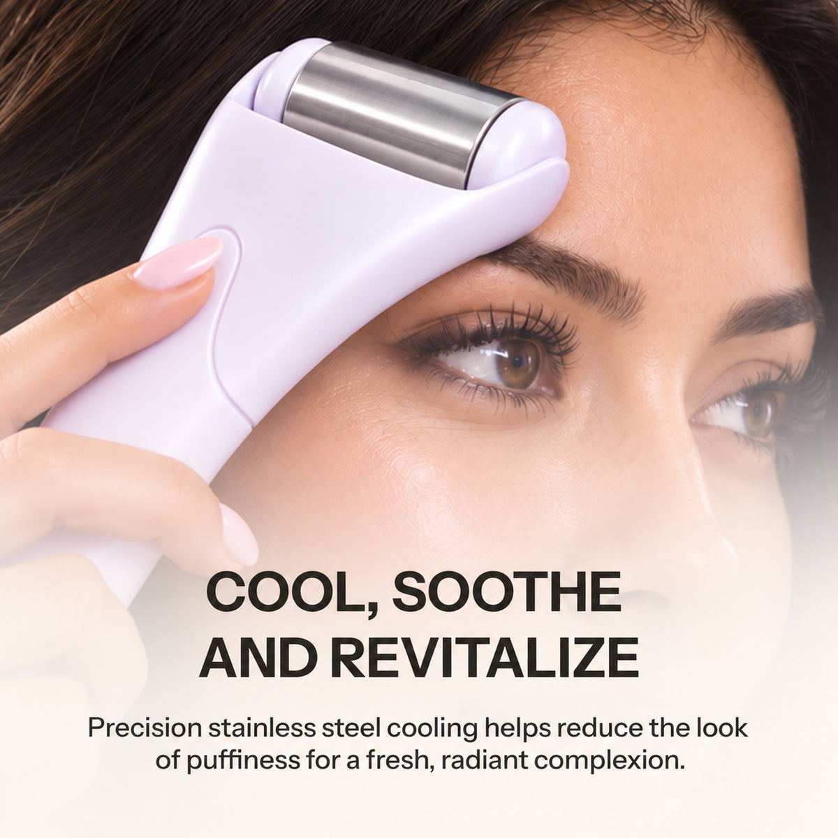 A close-up of a woman holding a light purple and stainless steel facial roller against her forehead, with text overlay reading 'COOL, SOOTH AND REVITALIZE'.