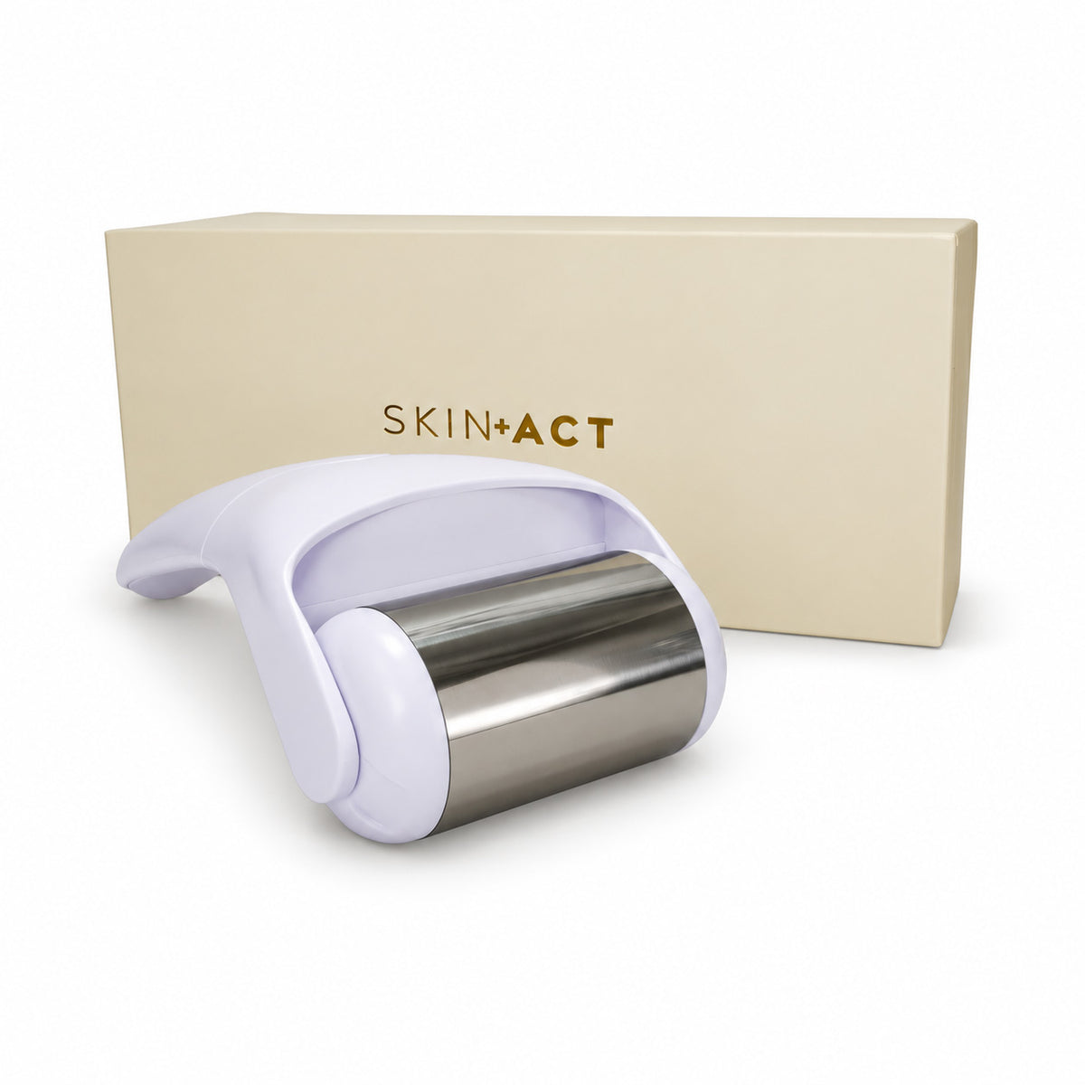 A Skin+Act skin roller with a white handle and stainless steel roller barrel, shown in front of its beige packaging box on a white background.